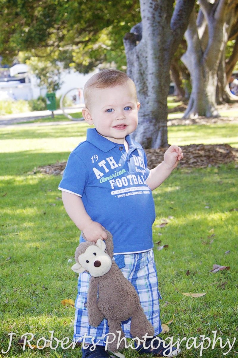 Little boy and his toy monkey - family portrait photography sydney